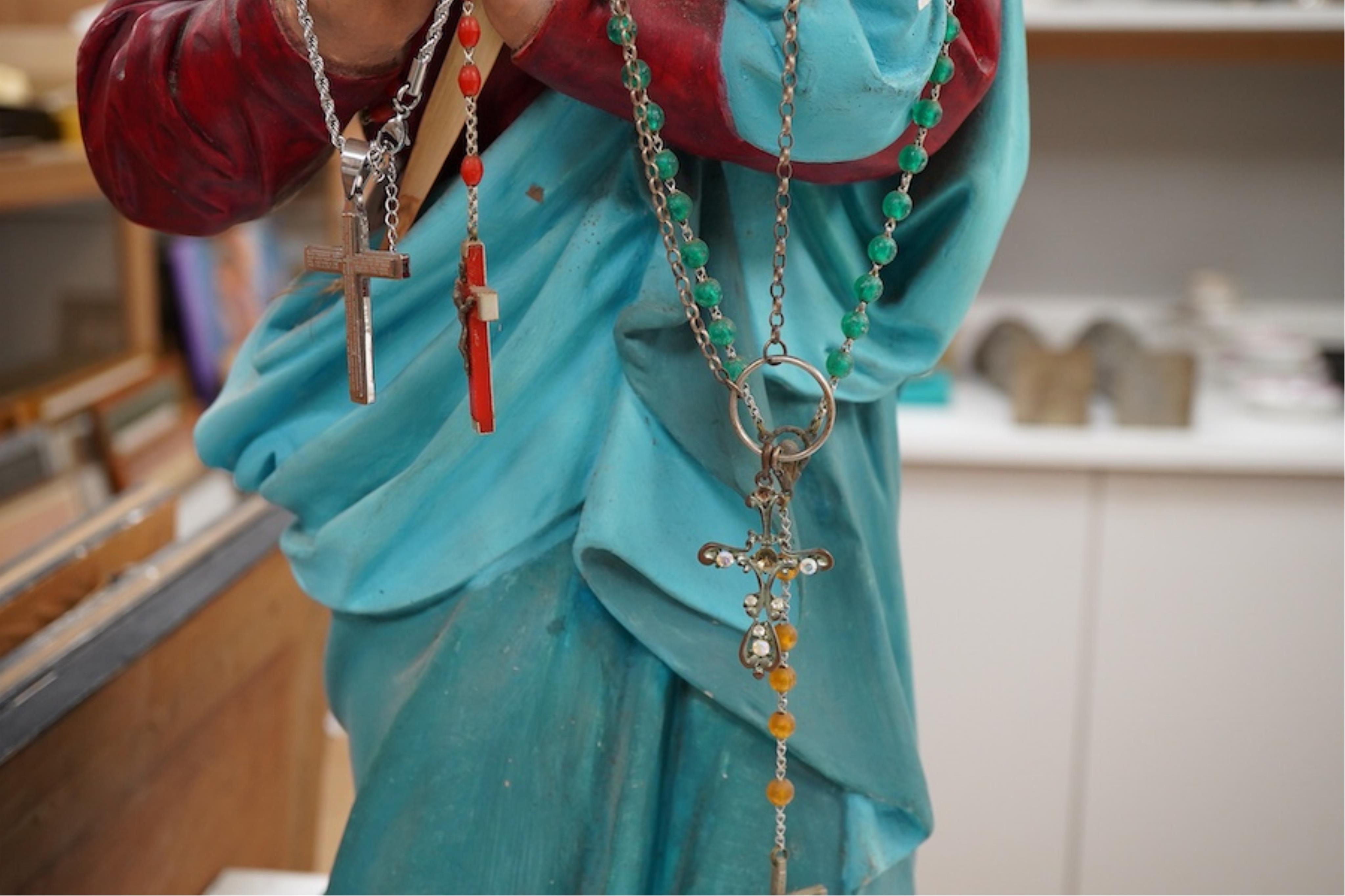 A plaster figure of Madonna at prayer, 61cm